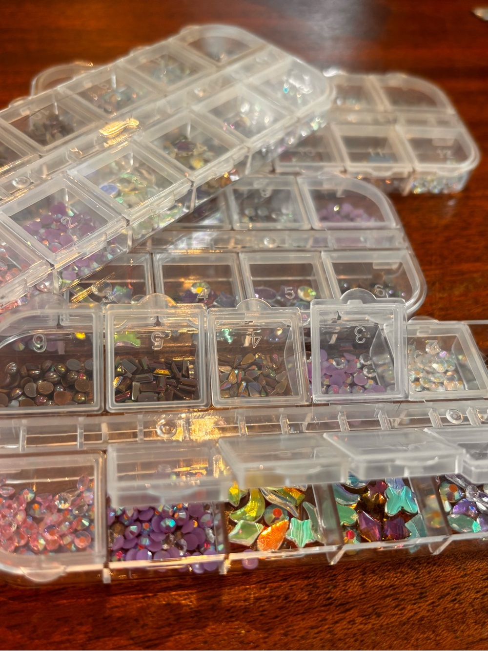 Nail gems Bulk lot of 4 storage cases full of asst gems